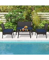 Sugift 4 Pieces Rattan Conversation Set with Tempered Glass Coffee Table