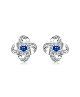 White Gold Plating with Colored Cubic Zirconia Swirled Stud Earrings
