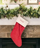 Village Lighting Garland and christmas stocking holder for mantle