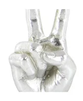 CosmoLiving by Cosmopolitan Set of 3 Silver Polystone Traditional Hand Sculpture, 7", 7", 6" - Silver