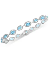 Blue Topaz (7-3/8 ct. t.w.) & Diamond (1/10 ct. t.w.) Link Bracelet in Sterling Silver