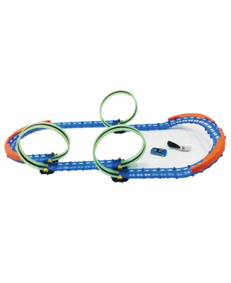 R/C car and track with three loops and glow trace technology.