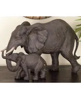 Dark Eclectic Resin Elephant Sculpture, 9" x 14"