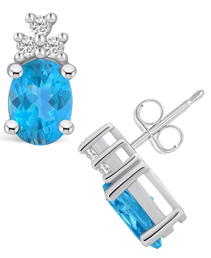 Macy's Topaz (3-1/5 ct. t.w.) and Diamond (1/5 ct. t.w.) Stud Earrings in 14K Gold