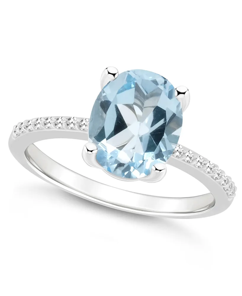 Macy's Women's Sky Blue Topaz (3-3/5 ct.t.w.) and Diamond (1/10 ct.t.w.) Ring in Sterling Silver