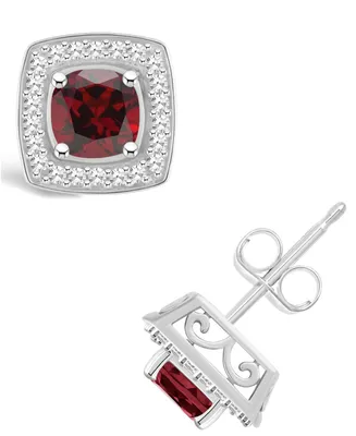 Macy's Garnet (1-1/2 ct. t.w.) and Diamond (1/5 ct. t.w.) Halo Studs in Sterling Silver