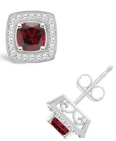 Macy's Garnet (1-1/2 ct. t.w.) and Diamond (1/5 ct. t.w.) Halo Studs in Sterling Silver