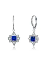 Genevive Sterling Silver Princess and Round Cubic Zirconia Leverback Earrings