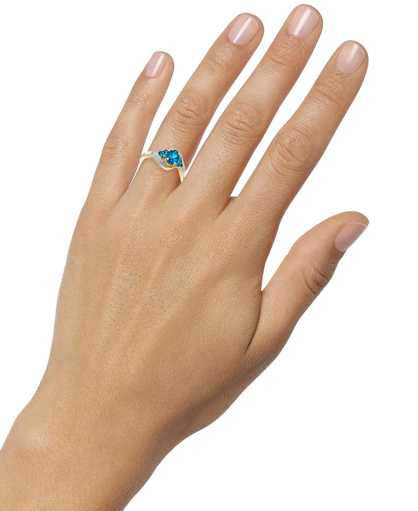 Blue Topaz (1-1/3 ct. t.w.) & Diamond (1/20 ct. t.w.) Swirl Ring in 10k Gold