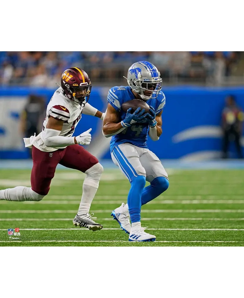 Amon-Ra St. Brown Detroit Lions Unsigned Makes a Reception 11" x 14" Photograph