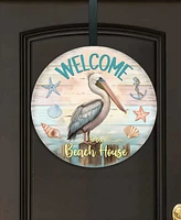 Designocracy Holiday Wooden Door Decor Welcome Sign Pelican Welcome Sign G. DeBrekht