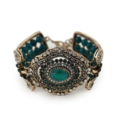 Sohi Women's Green Embellished Ethnic Statement Bracelet