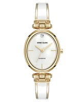 Anne Klein Women's Quartz Oval Diamond Accented Gold-Tone Alloy Metal Bangle Watch, 26mm