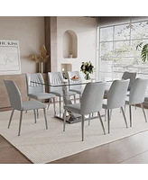 Simplie Fun Table and chair set.Contemporary, minimalist rectangular dining table featuring a clear tempered glass top and sleek silver legs. Paired w