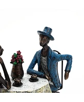LuxenHome Modern Brown Polyresin Couple Date Night Tabletop Home Decor