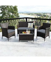 Sugift 4 Pieces Comfortable Outdoor Rattan Sofa Set with Glass Coffee Table-Gray