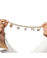 Juicy Couture Gold-Tone Charm Bracelet with Bow and Pave Details