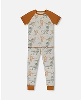 Deux par Baby Boys Cotton Two-Piece Short Sleeve Top And Pant Pajama Set Dinosaur On Mottled Tan Background