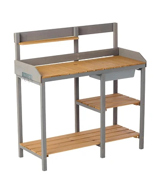Outdoor potting bench with cabinet