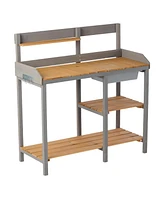 Outdoor potting bench with cabinet