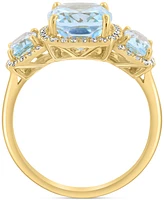 Effy Sky Blue Topaz (4-1/4 ct. t.w.) & Diamond (1/4 ct. t.w.) Three Stone Halo Ring in 14k Gold
