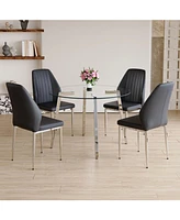 Modern Glass and Metal Table with 4 Black Pu Comfort Chairs
