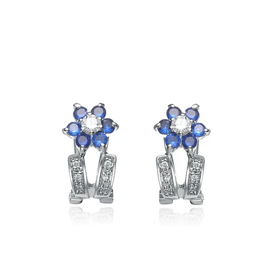 Genevive Sterling Silver White Gold Plating with Blue Cubic Zirconia Flower-Inspired Omega Back Earrings