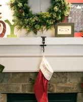 Village Lighting Garland and christmas stocking holder for mantle