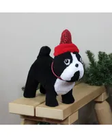 Northlight 11.5" Black and White Plush Standing Bulldog with Red Hat Christmas Decoration