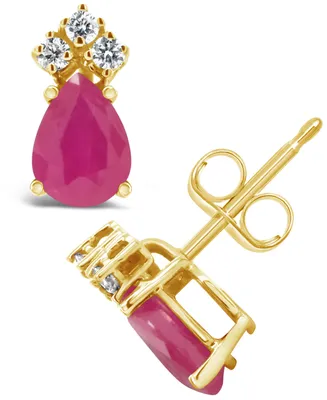 Ruby (1-1/ ct. t.w.) and Diamond (1/8 ct. t.w.) Stud Earrings in 14k Yellow Gold