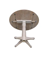International Concepts 42" Round Dual Drop Leaf Pedestal Table