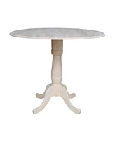 International Concepts 42" Round Dual Drop Leaf Pedestal Table