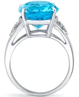 Blue Topaz (12 ct. t.w.) & Diamond Accent Ring in Sterling Silver