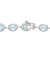 Blue Topaz (7-3/8 ct. t.w.) & Diamond (1/10 ct. t.w.) Link Bracelet in Sterling Silver