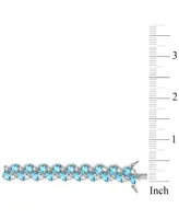 Swiss Blue Topaz (20 ct. t.w.) & White Topaz (5-1/3 ct. t.w.) Cluster Bracelet in Sterling Silver