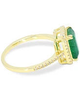 Emerald (2-3/4 ct. t.w.) & White Sapphire (1/4 ct. t.w.) Halo Ring in 14k Gold (Also available in Sapphire)