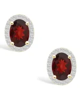 Garnet (1-9/10 ct. t.w.) and Lab Grown Sapphire (1/5 ct. t.w.) Halo Studs in 10K Yellow Gold