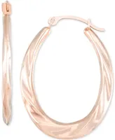 Textured Oval Hoop Earrings in 10k Gold.