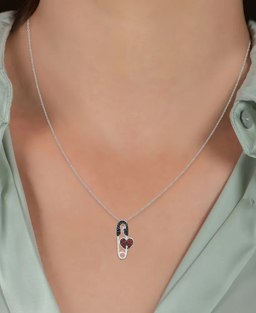 Enchanted Disney Fine Jewelry Garnet Accent & Black Diamond (1/8 ct. t.w.) Cruella Safety Pin Pendant Necklace in Sterling Silver & Black Rhodium