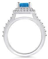 Blue Topaz and Diamond Halo Ring