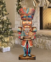 Designocracy Nutcracker with a Heartwarming Surprise 32" Outdoor Holiday Lawn Decor G. DeBrekht