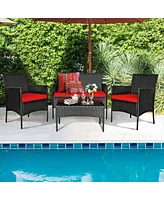 Sugift 4 Pieces Patio Rattan Cushioned Sofa Set with Tempered Glass Coffee Table-Red