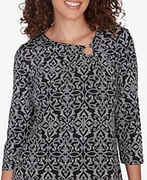 Ruby Rd. Petite Ring Neck Medallion Puff Printed Knit Top with Asymmetric Hem