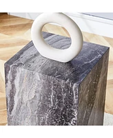 Elevate your living space with this modern Mdf coffee table, which showcases gray textured patterns. It is characterized by stylish design.