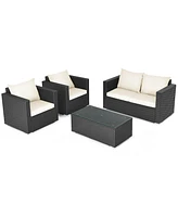 Gouun 4 Pieces Patio Rattan Conversation Set with Padded Cushion and Tempered Glass Table