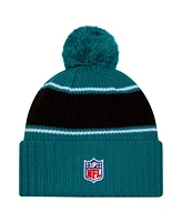 New Era Men's Teal Jacksonville Jaguars 2024 Sideline Cuffed Knit Hat with Pom