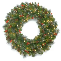 National Tree Company 48" Crestwood Spruce Wreath with Silver Bristle, Cones, Red Berries and Glitter with 250 Clear Lights