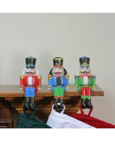 Northlight Set of 3 Red Blue and Green Nutcracker Christmas Stocking Holders 7.5"