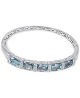 Blue Topaz (14 ct. t.w.) & Diamond (1/8 ct. t.w.) Bangle Bracelet in Sterling Silver