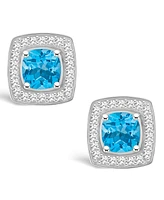 Macy's Blue Topaz (1-1/2 ct. t.w.) and Diamond (1/5 ct. t.w.) Halo Studs in Sterling Silver